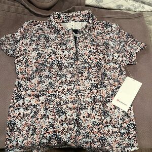 Lululemon NWT Quick dry short sleeve polo. Size 8